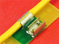Part Number 1286, one of the new Surface Mount Insulation Piercing Crimp Terminals.